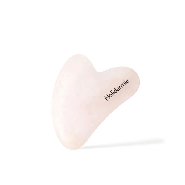 Gua Sha face in pink quartz Gua Sha face in pink quartz