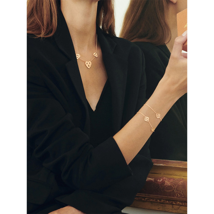 Bracelet coeur entrelacé - Or rose