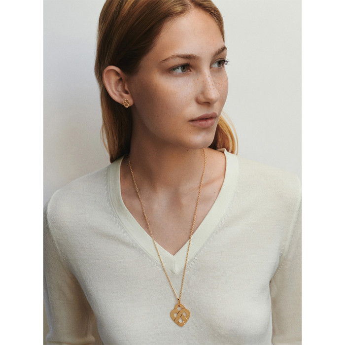 Boucles d'oreilles coeur entrelacé - Or jaune Boucles d'oreilles coeur entrelacé - Or jaune