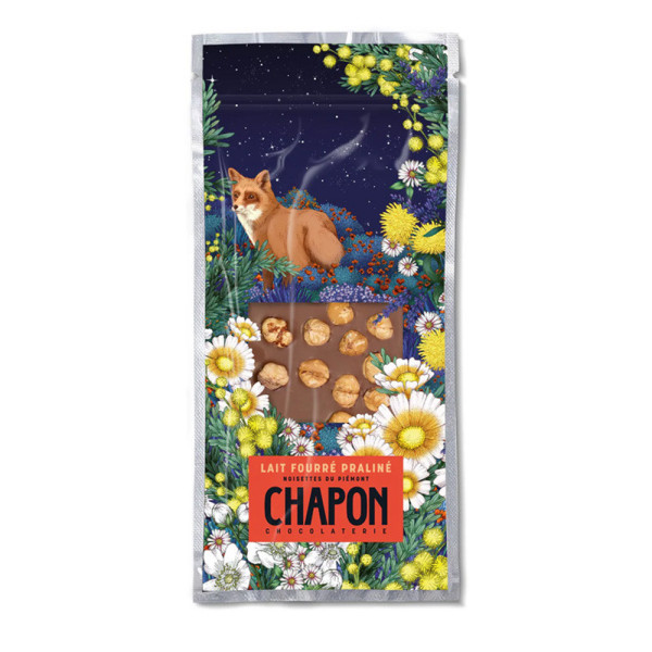 Milk chocolate bar filled with Praline and whole Piedmont hazelnuts Milk chocolate bar filled with Praline and whole Piedmont hazelnuts