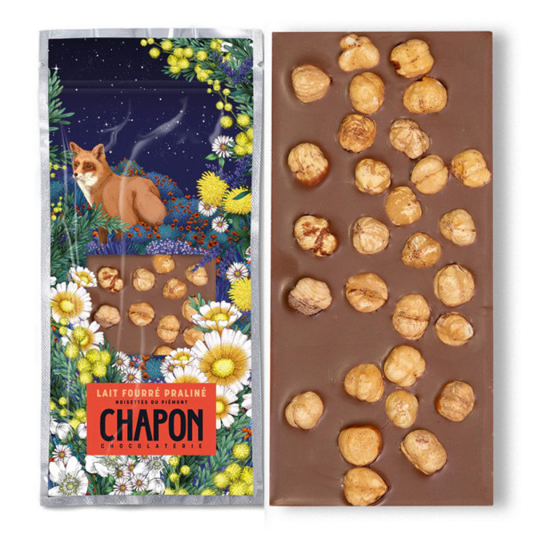 Milk chocolate bar filled with Praline and whole Piedmont hazelnuts Milk chocolate bar filled with Praline and whole Piedmont hazelnuts