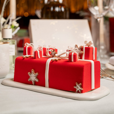 Bûche de Noël "Cadeaux" - citron, yuzu et framboise pour 6/8 personnes