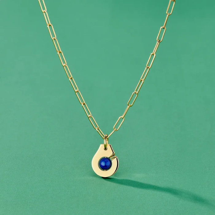 Collier Menottes dinh van R10 en or jaune et lapis lazuli - dinh van