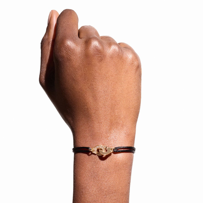 Bracelet sur cordon Menottes dinh van petit modèle or jaune et diamants